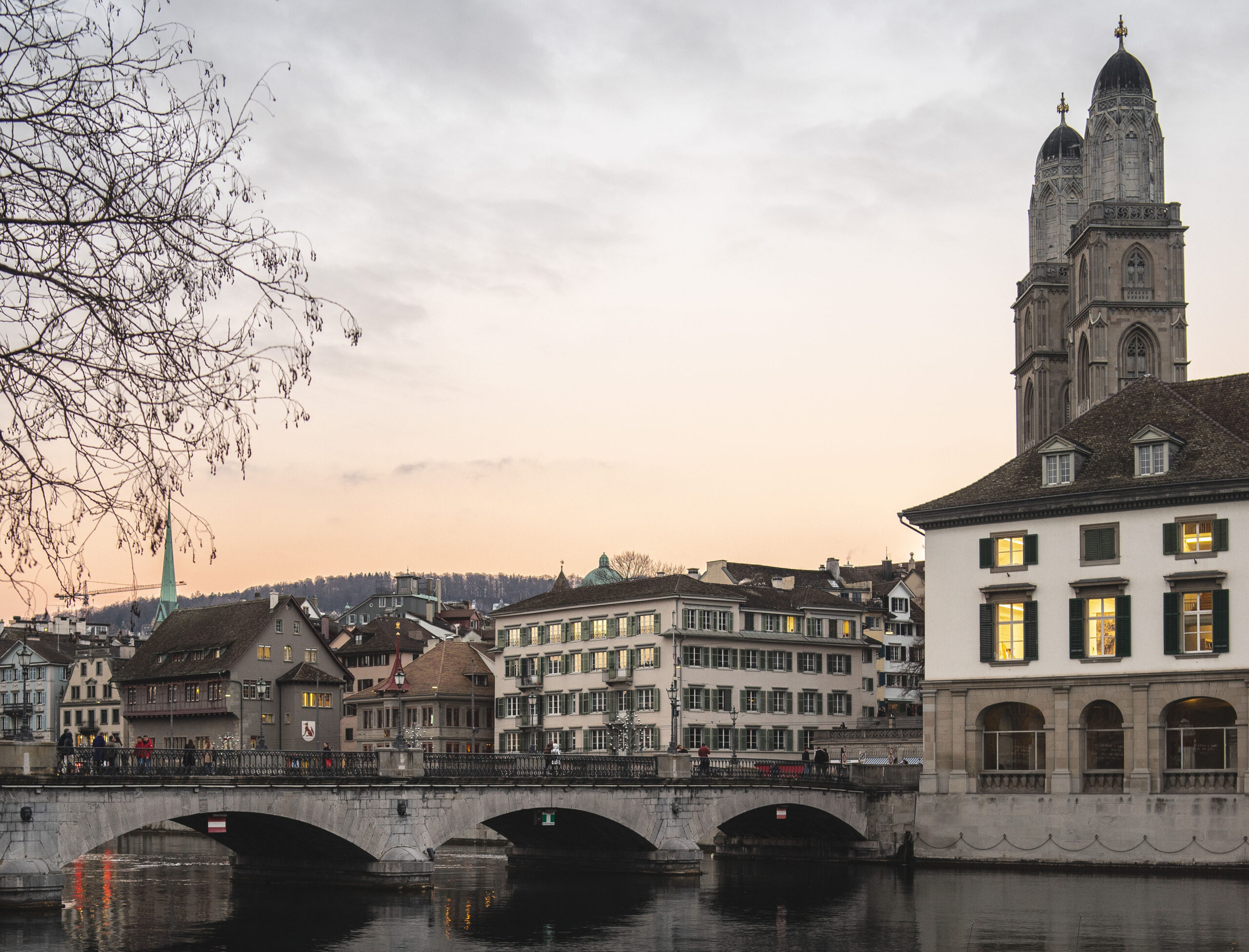 Zurich, Switzerland with Munsterbrucke bridge over Limmat river